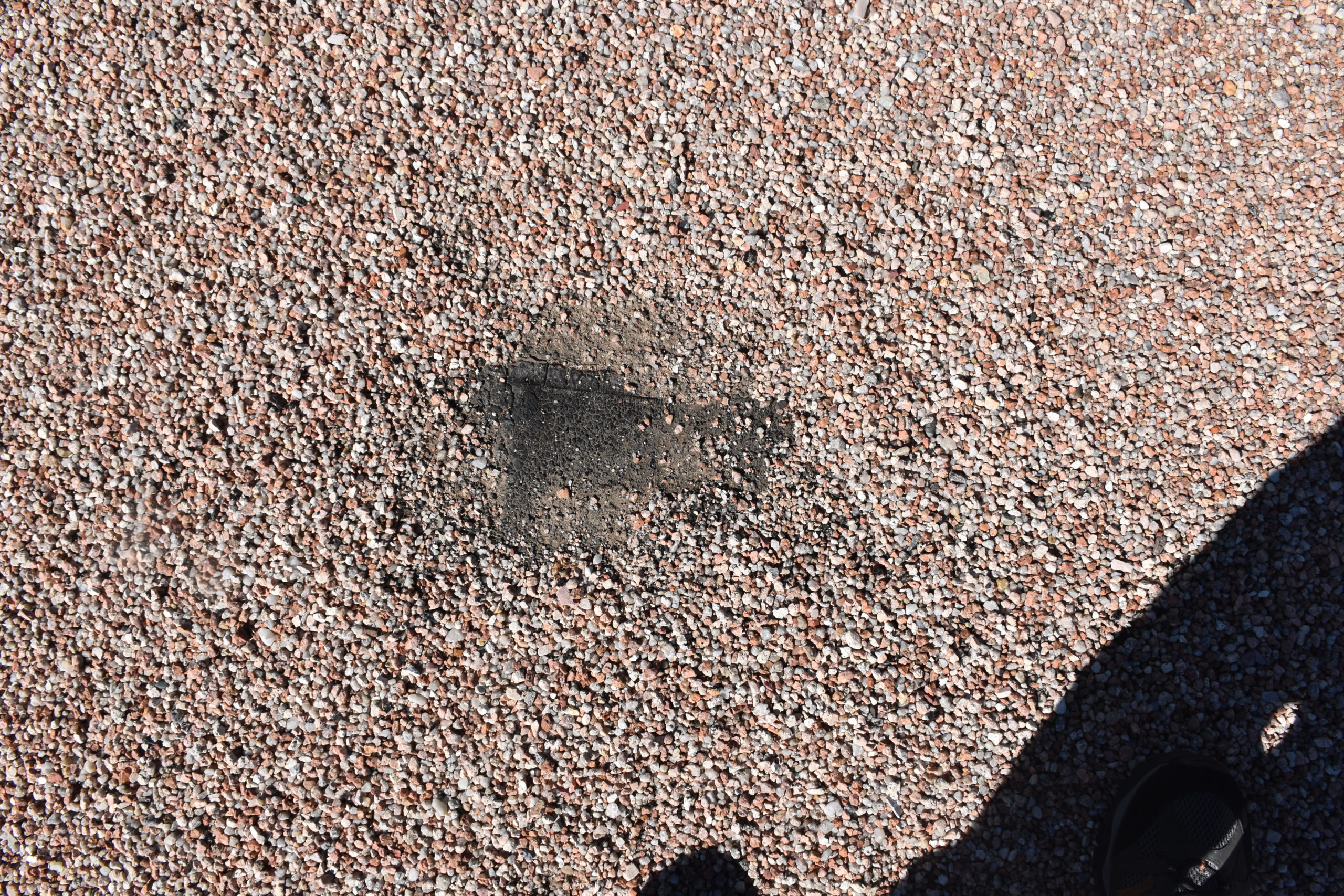 Hail damage to Mod Bit Roof Rivet Engineering